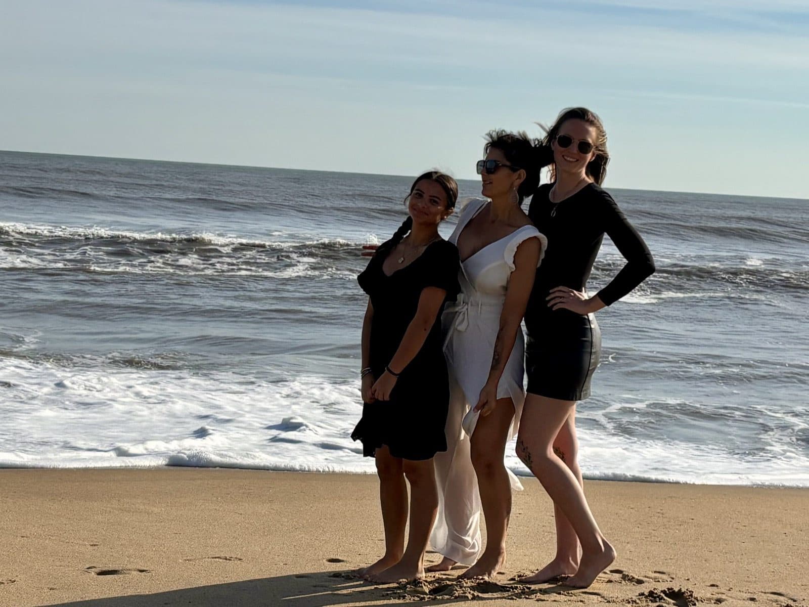 Jessica with her team on the beach in Hampton Roads